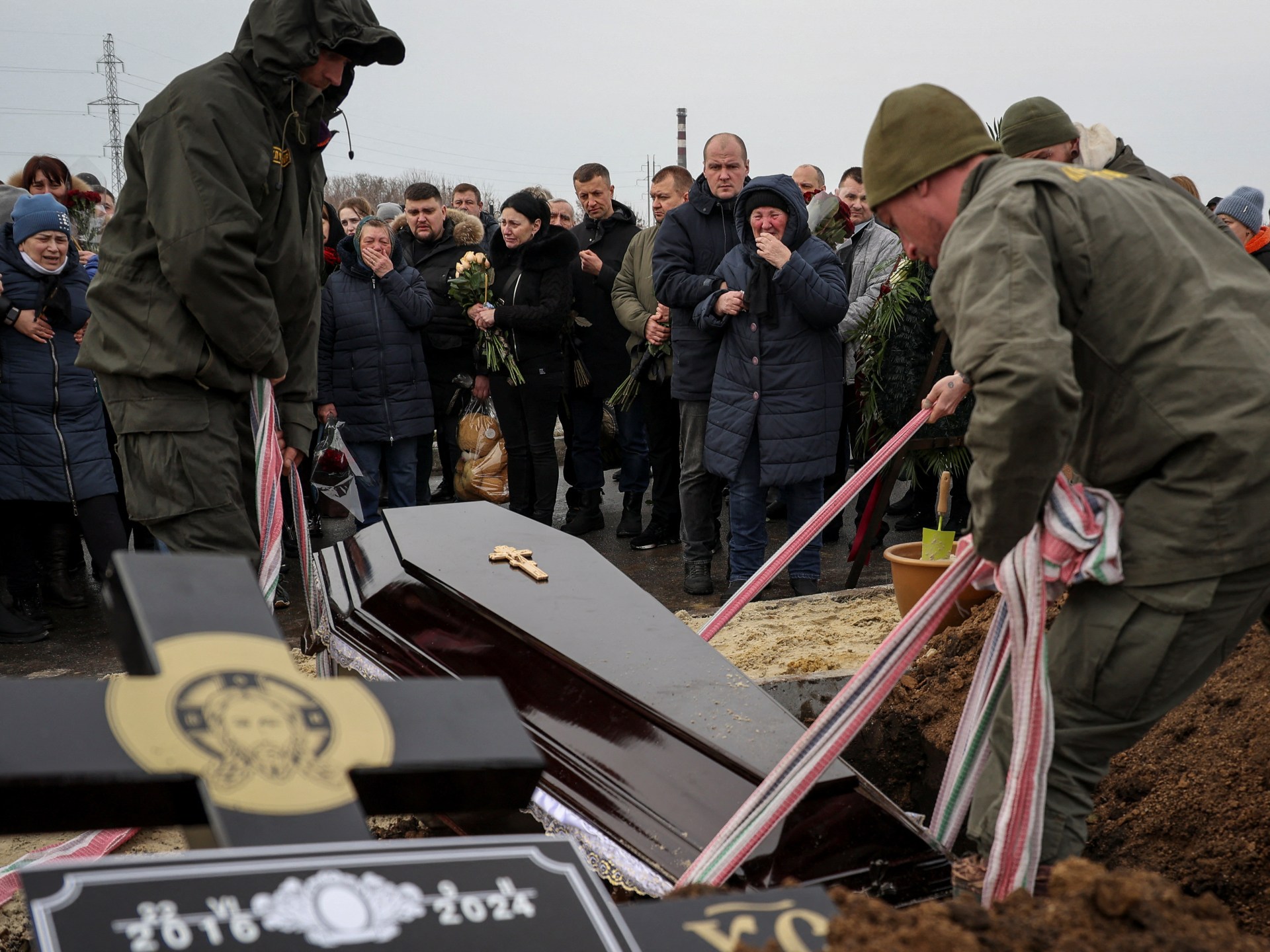 2024-02-12T145432Z_99227010_RC2Y06A28NX8_RTRMADP_3_UKRAINE-CRISIS-FUNERAL-FAMILY-1707786122.jpg