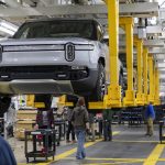 107384151-1709835368416-gettyimages-2023738908-BIZ-AUTO-RIVIAN-LAYOFFS-TB.jpeg