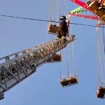 Emergency-personnel-rescue-13-people-stranded-on-amusement-park-ride.jpg