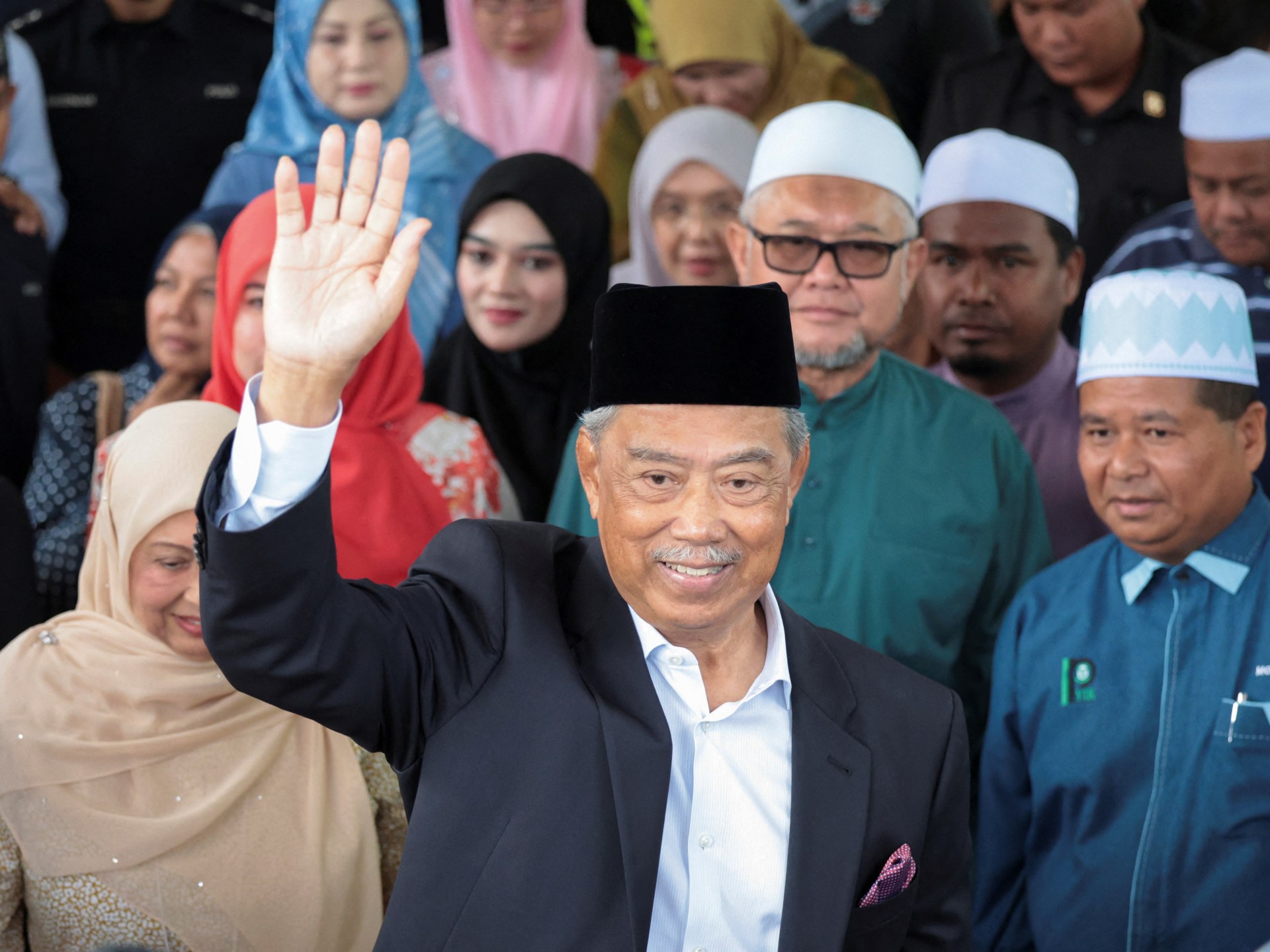 2024-08-27T024944Z_858459891_RC22O9A8C7WE_RTRMADP_3_MALAYSIA-POLITICS-MUHYIDDIN-1724733476.jpg