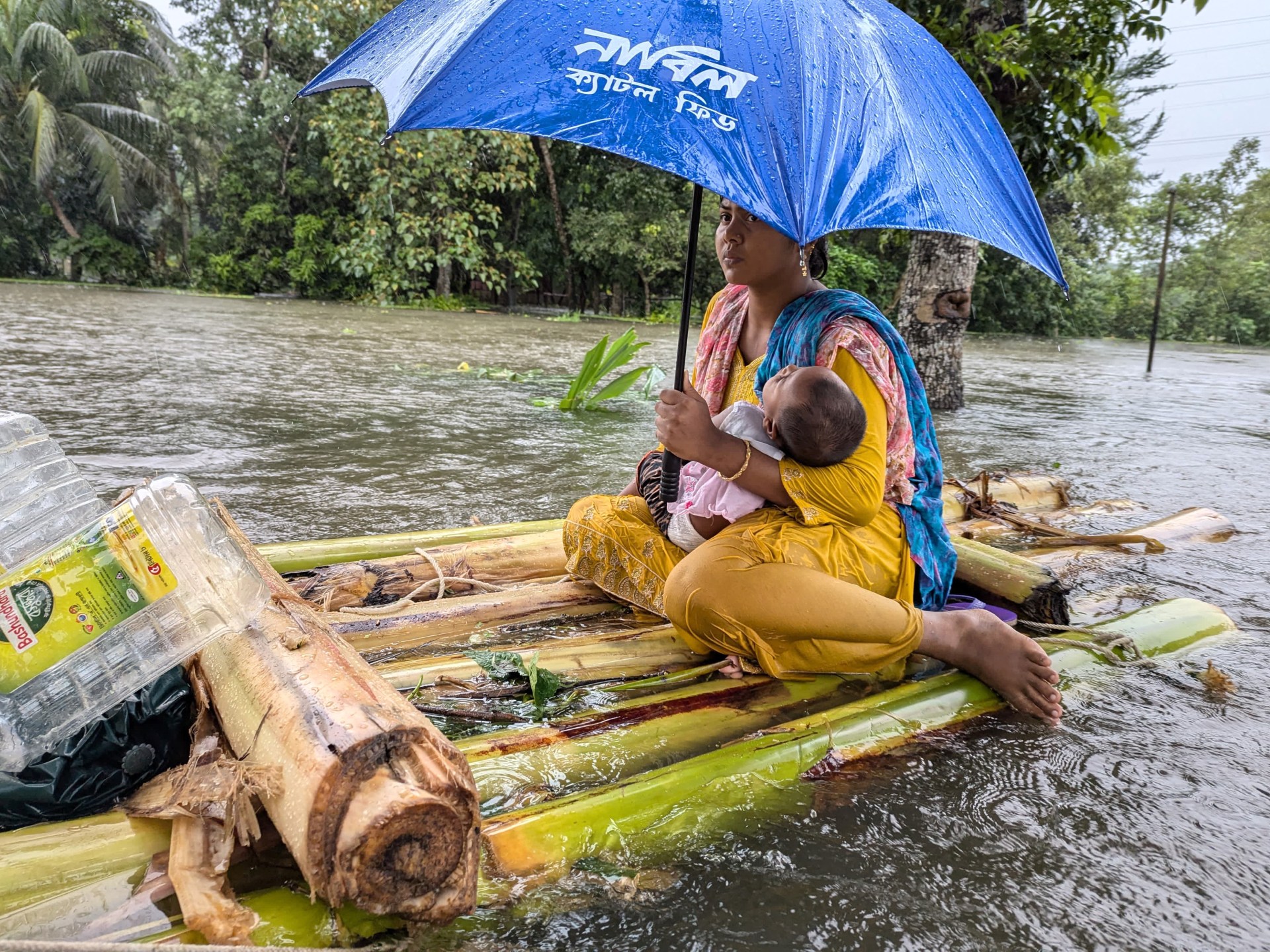 AFP__20240822__36EN4HU__v3__HighRes__TopshotBangladeshWeatherFlood-1724757252.jpg