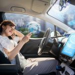 woman-using-smart-phone-in-autonomous-car-scaled.jpg