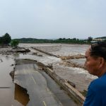 AFP__20250728__682N2G4__v2__HighRes__TopshotChinaEnvironmentWeatherFloods-1753749424.jpg