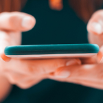 Person_holding_a_phone_600x300.png