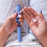 woman-holding-glp1-medication.jpg