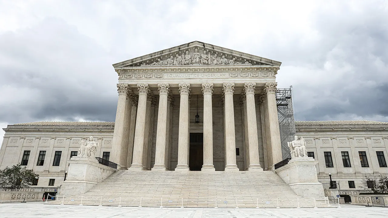 supreme-court-facade-clouds.jpg