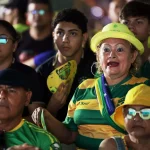 2026-06-25T002634Z_1360611607_UP1EM6P01868I_RTRMADP_3_SOCCER-WORLDCUP-SCO-BRA-FANS-MANAUS-1782717856.webp