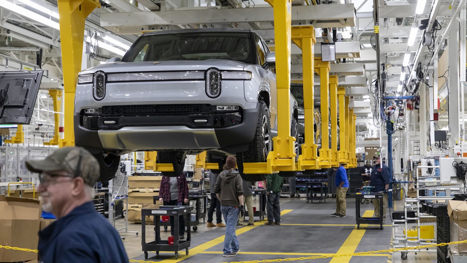 107384151-1709835368416-gettyimages-2023738908-BIZ-AUTO-RIVIAN-LAYOFFS-TB.jpeg