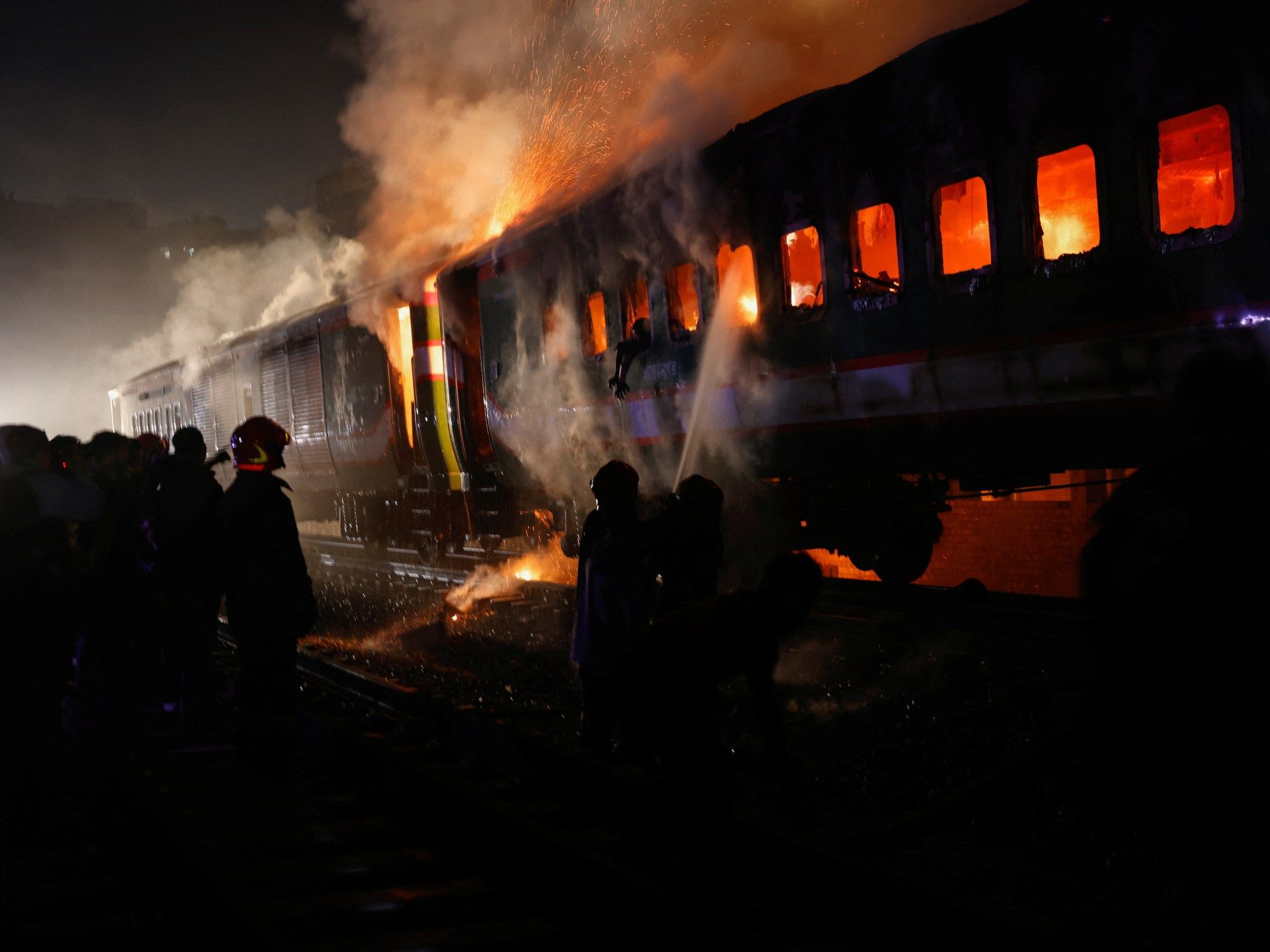 2024-01-05T161306Z_533510177_RC2RB5AZRVO4_RTRMADP_3_BANGLADESH-ELECTION-TRAIN-FIRE-1704480712.jpg