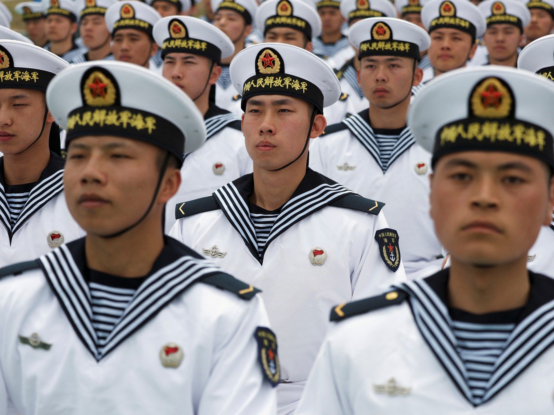 2024-04-21T073952Z_331648408_RC2RA7AE1JX5_RTRMADP_3_CHINA-MILITARY-NAVY-1718950269.jpg