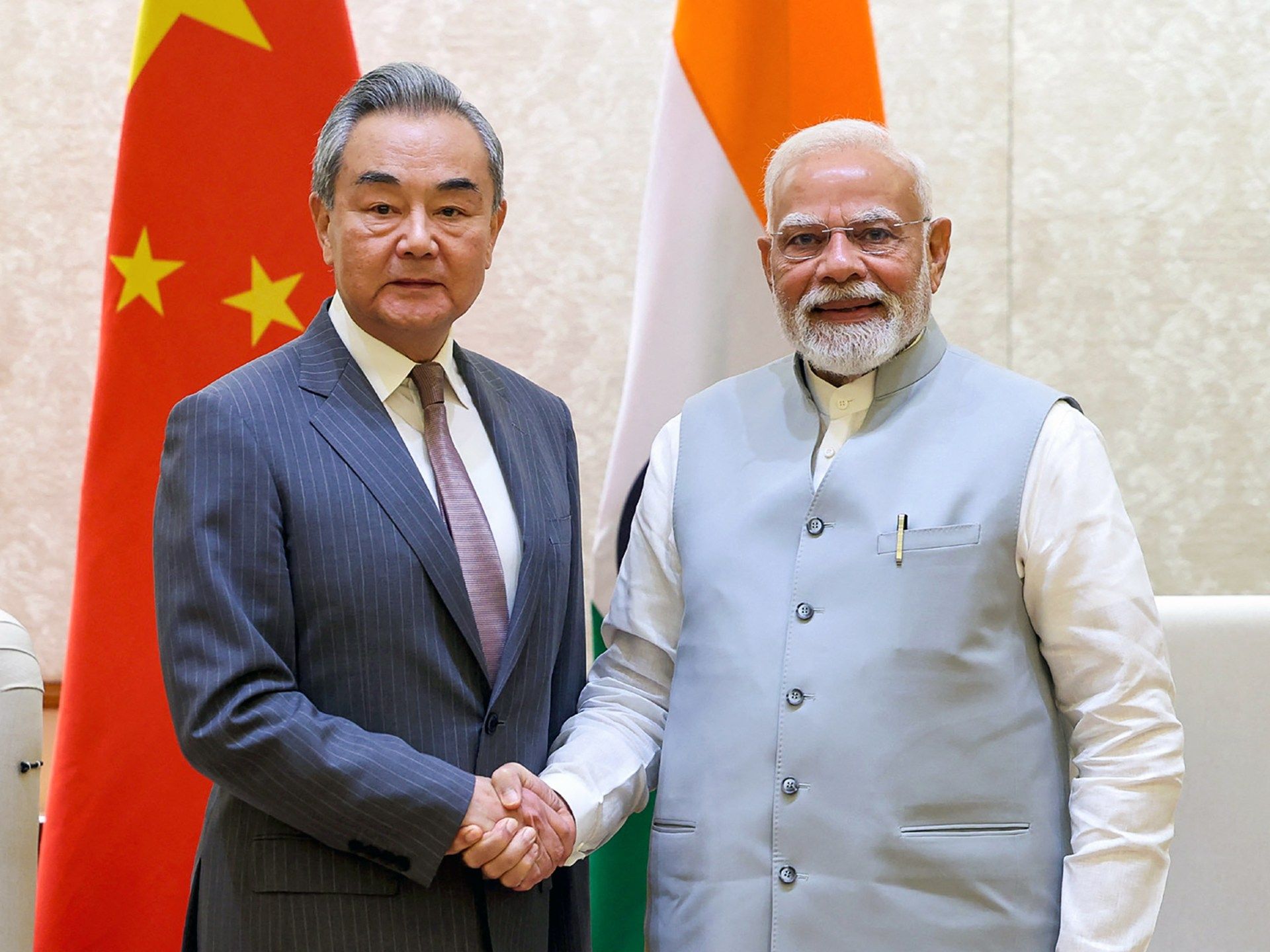 AFP__20250819__69XP2KE__v3__HighRes__IndiaChinaDiplomacy-1755695824.jpg