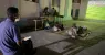 Adel-Mohsen-watches-the-opening-match-of-the-World-Cup-on-a-giant-public-screen-in-Mukalla-while-tak.webp