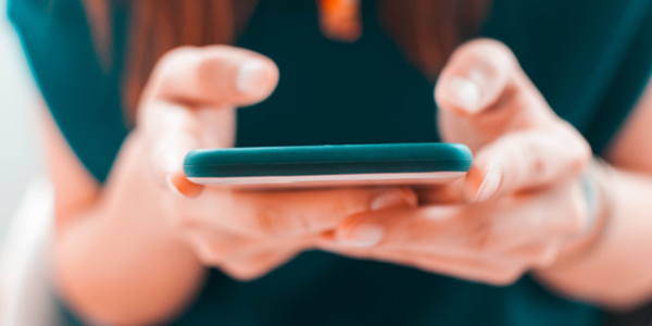 Person_holding_phone_600x300.png