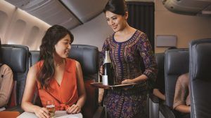 Premium-Economy_Serving_Champagne-e1724068225270-300x169.jpg