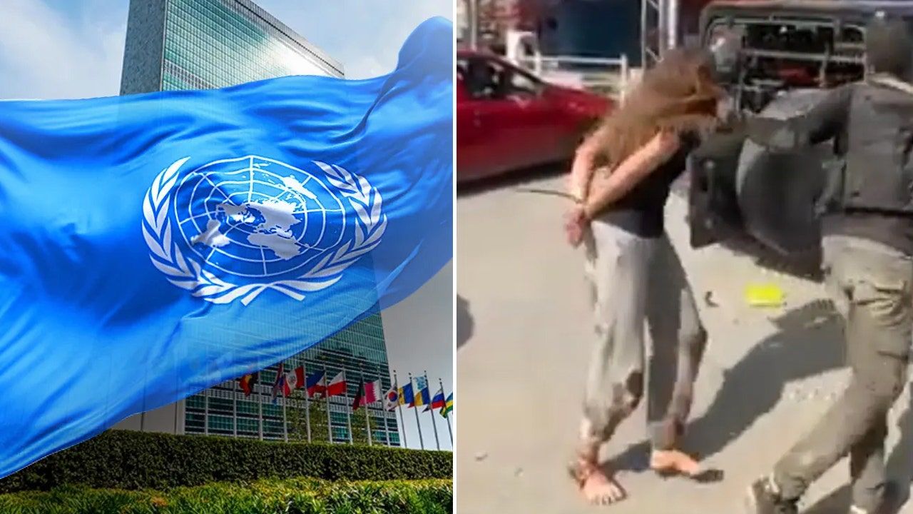 UN-flag-building-Woman-Hamas.jpg