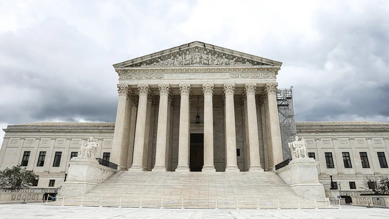 supreme-court-facade-clouds.jpg