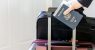 woman-holding-passport-luggage.jpg
