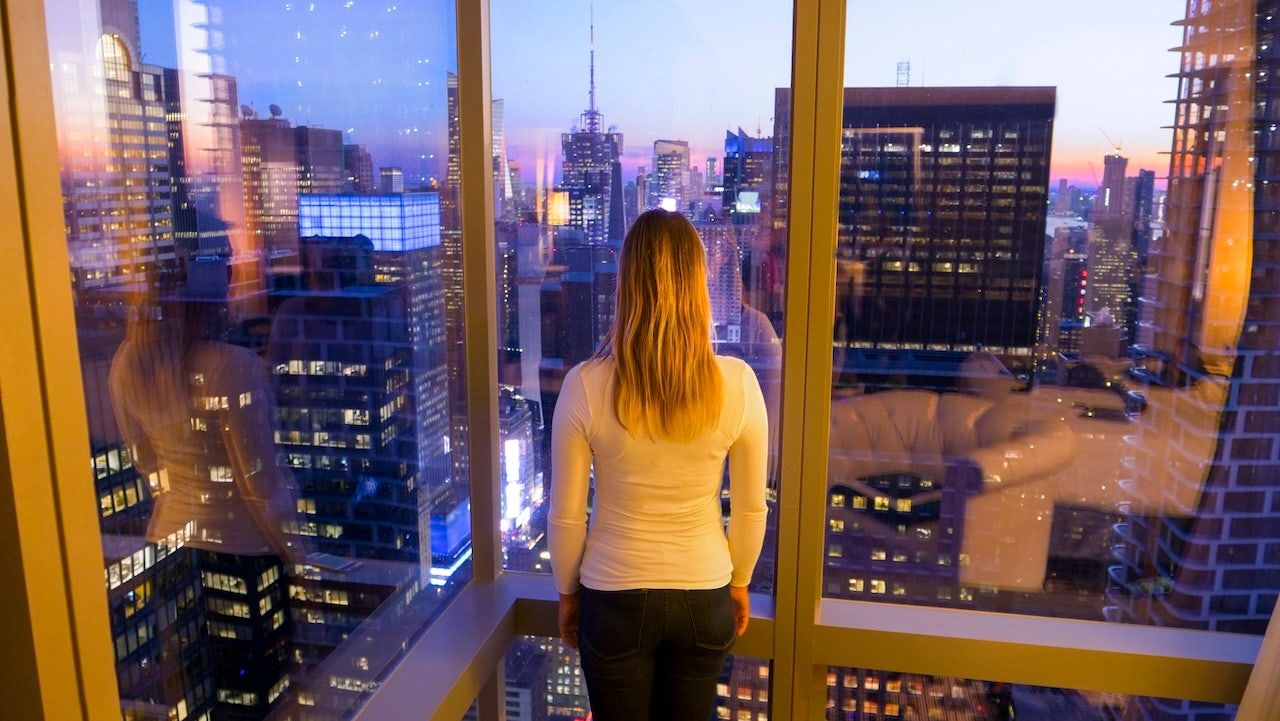 woman-window-city-lights-copy.jpg